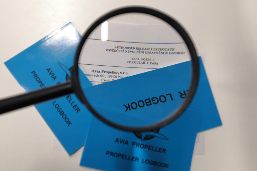 Propeller Logbooks under magnifying glass